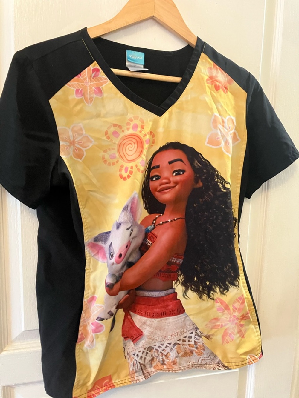 Disney Moana Graphic V-Neck Scrub Top in Yellow and Black